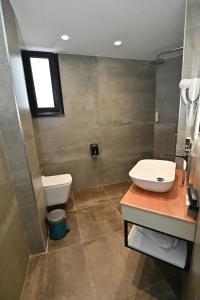 Koupelna v ubytování MondurO Hotel