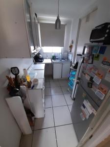 an overhead view of a kitchen with a refrigerator at Nova Vida in Santiago