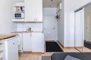 Η κουζίνα ή μικρή κουζίνα στο Nordstay - Stylish Central Studio self check-in +15 φωτογραφίες