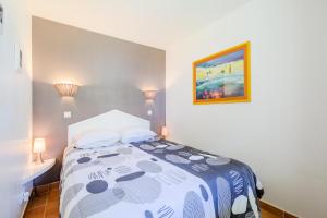 Postel nebo postele na pokoji v ubytování Résidence Les Rivages du Lac - maeva Home - Appartement 2 pièces 7 personnes - Sélection MAE-5661