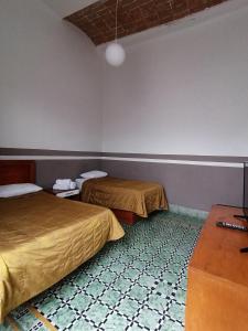 Postel nebo postele na pokoji v ubytování Casa Veeyuu