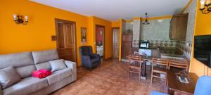 A seating area at Apartamentos La Corona - Cabrales