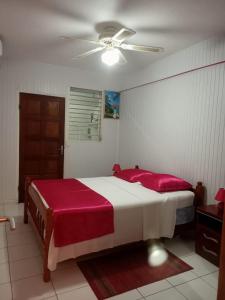 Postel nebo postele na pokoji v ubytování Appartement spacieux à Sainte-Anne avec piscine partagée. + 16 fotografií