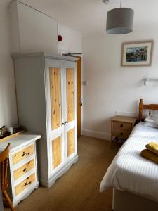 Postel nebo postele na pokoji v ubytování Lucerne B&B