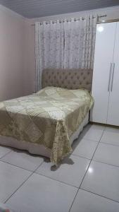 Кровать или кровати в номере Estadia da tranquilidade