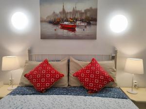Ein Bett oder Betten in einem Zimmer der Unterkunft Tranquilo apartamento con vistas al mar.