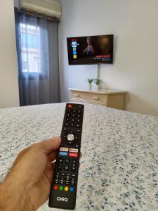 TV/Unterhaltungsangebot in der Unterkunft Tranquilo apartamento con vistas al mar.