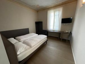 Postel nebo postele na pokoji v ubytování CorteCairoli