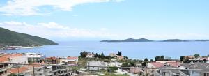 a view of a city and a body of water at ALTA MARE in Nea Peramos