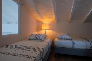 Ένα ή περισσότερα κρεβάτια σε δωμάτιο στο Masbango Beach Resort
