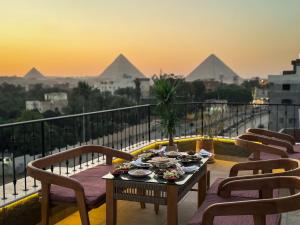 Area soggiorno di Almas Pyramids View Hotel