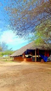 a large hut with a thatched roof at Ego Swargarajje Yala Thissamaharama in Tissamaharama