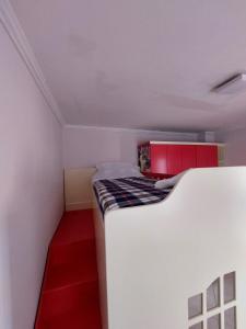 Postel nebo postele na pokoji v ubytování GEX Guest House