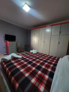 Postel nebo postele na pokoji v ubytování GEX Guest House