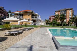 The swimming pool at or close to Il Gattino di Porto - apt 4 - Monolocale terrazzo piscina