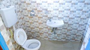 Koupelna v ubytování Nash3 Furnished Studio- CBD Nakuru