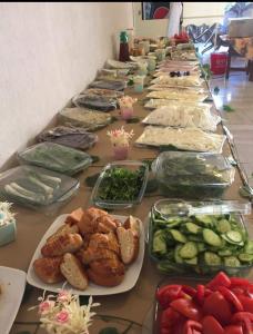 a long table filled with different types of food at KOSA OTEL in Marmaris