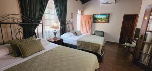 Зображення з фотогалереї помешкання Camilas Hotel у місті Сан-Педро-Сула