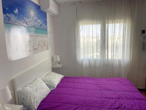 Postel nebo postele na pokoji v ubytování CALAFELL 5 BEACH