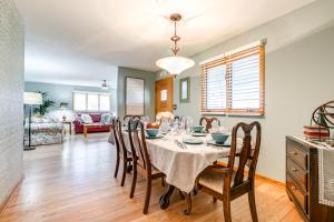 a dining room with a table and chairs at Pet-Friendly Lincoln Home 1 Mi to Gateway Mall in Lincoln