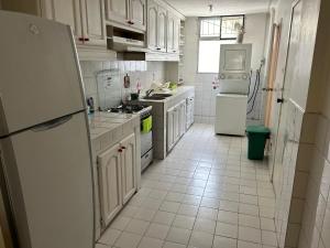 Η κουζίνα ή μικρή κουζίνα στο Departamento en Quito zona céntrica y turistica