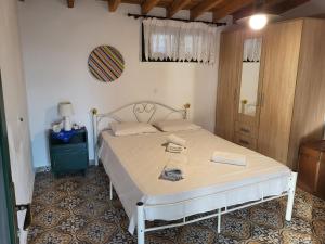 a bedroom with a bed in a room at Villa Kaliva Family house in Astris