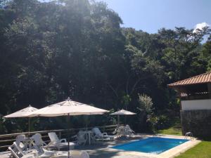 A piscina localizada em Pousada dos Anjos ou nos arredores