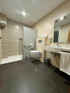 Koupelna v ubytování Cortiñas