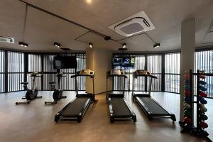 a gym with treadmills and treadles in a room at Ap luxo Jardins Pamplona cd 1111 in Sao Paulo