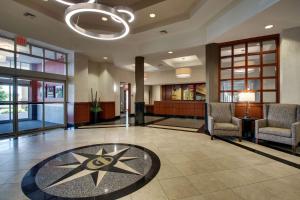 a lobby with chairs and a star on the floor at Drury Inn & Suites Findlay in Findlay