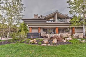 a large house with a lawn in front of it at Great Location, Hot Tub & Outdoor Recreation! Deer Valley Fawngrove Terrace in Park City