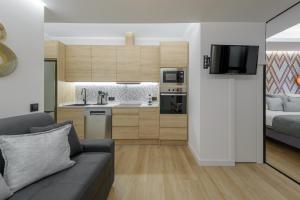Cucina o angolo cottura di GRAN VIA capitals by MONARO*****