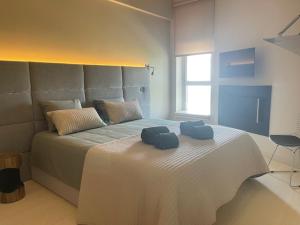 Rúm í herbergi á BestHomeStay-Lisbon (Campolide)