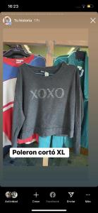 a grey sweater is on a display in a store at El pantano de sherk y fiona in San José de la Mariquina