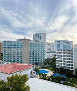 an aerial view of a city with tall buildings at TANGIER DUPLEX LUXURY apartment GUEST FRIENDLY B4 in Tangier