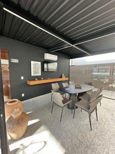 Istumisnurk majutusasutuses Studio central com lazer e spa