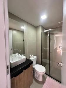 ห้องน้ำของ Studio central com lazer e spa