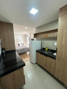 Köök või kööginurk majutusasutuses Studio central com lazer e spa