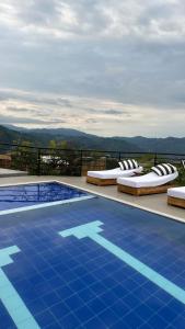 Bazén v ubytování Hotel Villa Del Sol nebo v jeho okolí