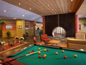a billiard room with a pool table in a house at Modern apartment located in the extensive Paradiski ski area in Arc 2000
