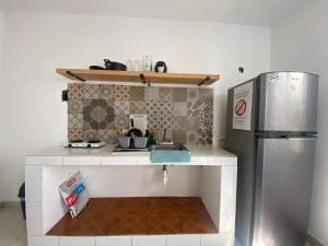 Cucina o angolo cottura di The Hostal Inn
