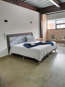 Hotel El Cordobes客房内的一张或多张床位