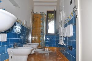 Koupelna v ubytování Residence Tre Palme + 37 fotografií
