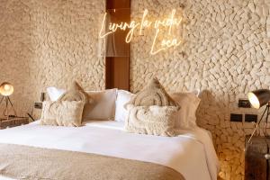 Postel nebo postele na pokoji v ubytování AWA Holbox Hotel Boutique - Beach Front