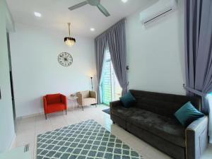 Zona de estar de EnaBella Homestay Pool Melaka