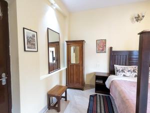 Postel nebo postele na pokoji v ubytování Cloudwalks Homestay