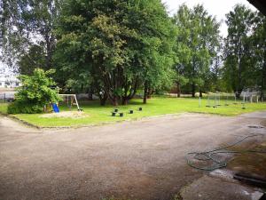 an empty park with a playground with a rope at Kanarbiku camping in Türi