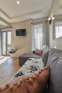 TV a/nebo společenská místnost v ubytování Nival Luxury Suites