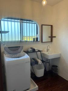 Fotografie z fotogalerie ubytování 海と山と川、田園に囲まれた静かな古民家一棟貸し v destinaci Mijazaki