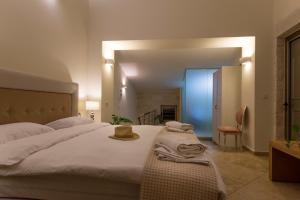 A bed or beds in a room at Libyan Mare Még 14 kép